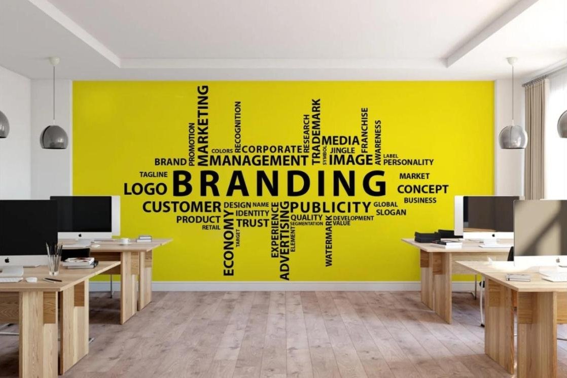 Yellow branding word wall printed in an office